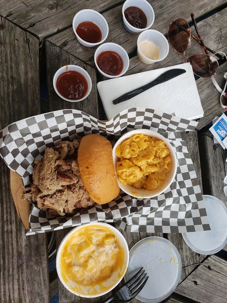 Pulled Pork Sandwich with Mac and Cheese and Cheesy Potatoes for Sides